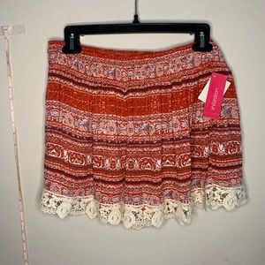 red flowy lace shorts